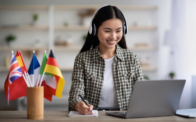 happy-asian-woman-learning-foreign-language-online.jpg happy-asian-woman-learning-foreign-language-online.jpg